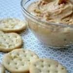 These Dad's Peanut Butter Frosting Crackers will be your new favorite treat! A delicious peanut butter frosting sandwiched between two buttery crackers. This will be a decadent late night snack!