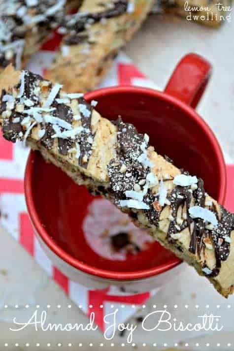 Almond Joy Biscotti is sinfully delicious! This rich biscotti is stuffed with chocolate, coconut, and almonds and drizzled with more of the same!