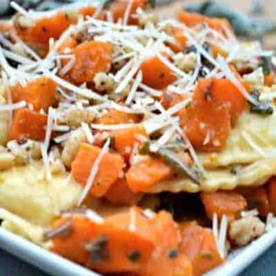 Butternut Squash Ravioli is simply delectable as a main dish or side dish. Cheese ravioli is topped with delicious butternut squash, fresh sage and walnuts. This is perfect for those cold winter nights!