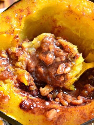 Candied Acorn Squash is baked with brown sugar, butter, cinnamon, nutmeg, and walnuts. This delectable tasty side dish perfect is just for the holidays!