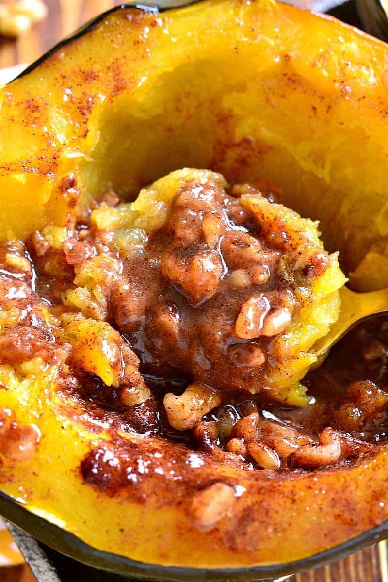 Candied Acorn Squash is baked with brown sugar, butter, cinnamon, nutmeg, and walnuts. This delectable tasty side dish perfect is just for the holidays!