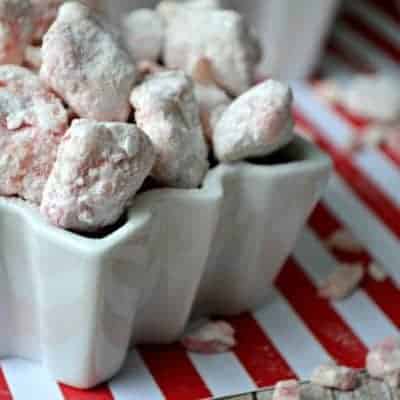 Candy Cane Muddy Buddies are a sweet and crunchy mint treat sure to please everyone over the holidays! Chocolate and Mint - It's pure peppermint perfection!