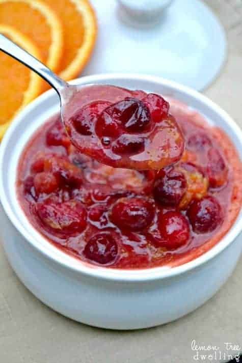 Orange Spiced Cranberry Sauce is not your basic cranberry sauce! These tart cranberries and the sweetness of oranges are mixed with flavorful spices for a Thanksgiving side dish that will please a crowd!