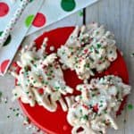 Crunchy peanuts and chow mein noodles, smothered in white chocolate and decorated with festive red, green & white sprinkles. A salty-sweet, crunchy treat!