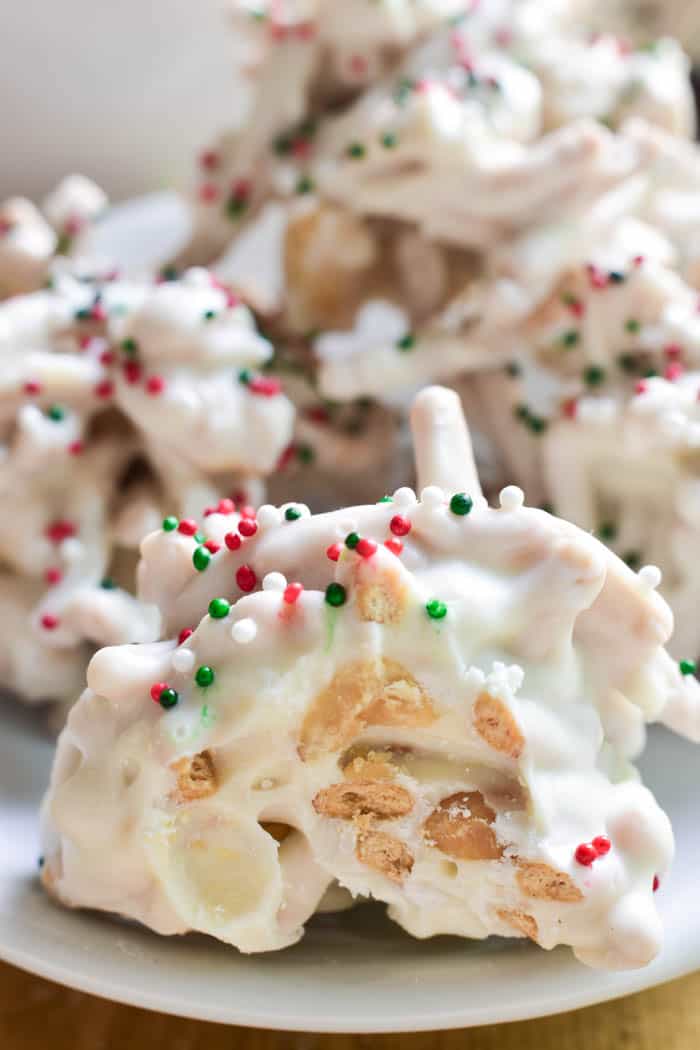 White Chocolate Ting-a Lings are one of our favorite holiday treats! Loaded with salty peanuts and crunchy chow mein noodles, then smothered in white chocolate and decorated with red, green & white Christmas sprinkles, they're the perfect salty-sweet no-bake treat.