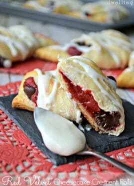 Red Velvet Cheesecake Crescent Rolls are stuffed with a creamy red velvet and dark chocolate filling.