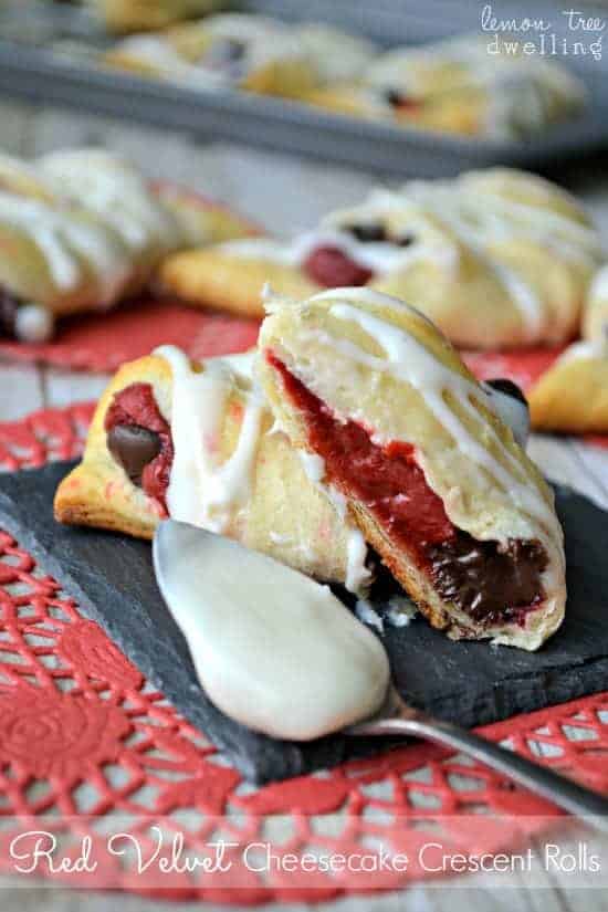 Red Velvet Cheesecake Crescent Rolls are stuffed with a creamy red velvet and dark chocolate filling.