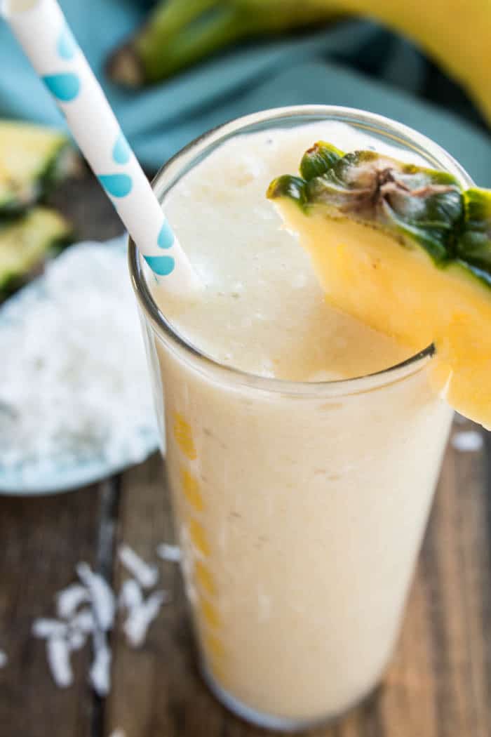 Banana Colada Smoothies - all the flavors of a pina colada, with the delicious addition of banana, in a tasty treat the whole family can enjoy!