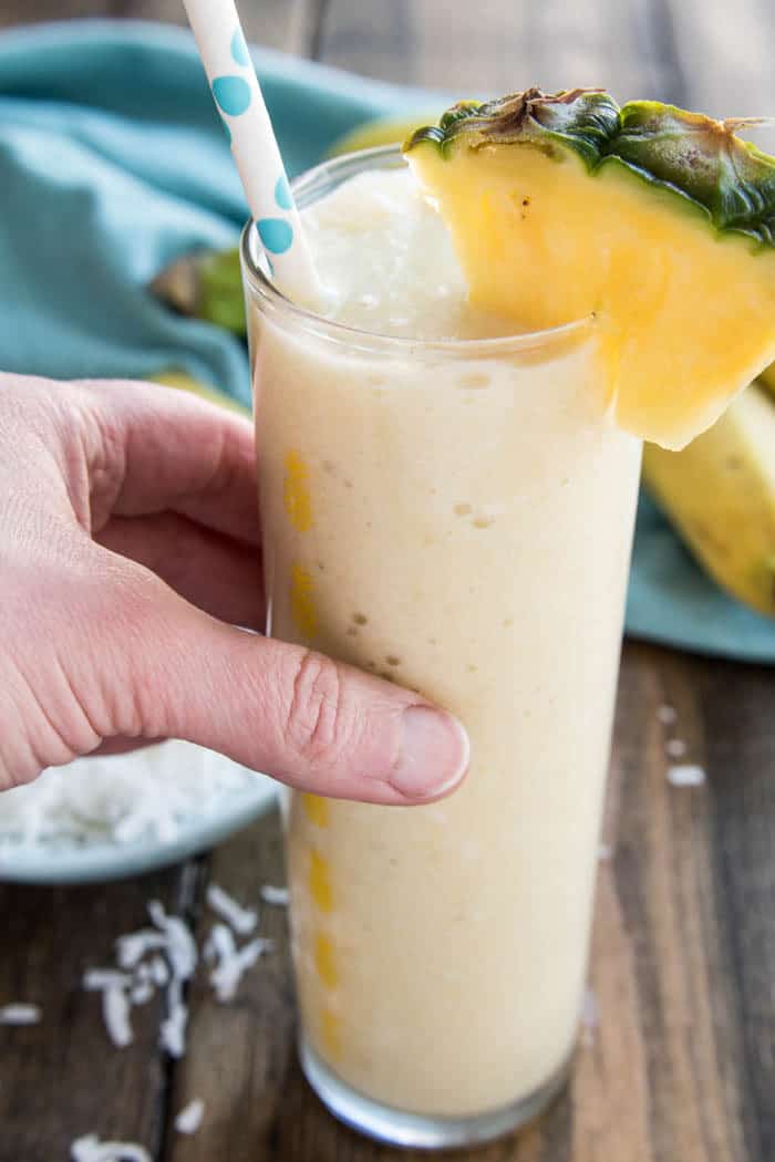 Banana Colada Smoothies - all the flavors of a pina colada, with the delicious addition of banana, in a tasty treat the whole family can enjoy!