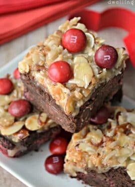 German Chocolate Cherry Bars are loaded with Cherry M&Ms and topped with a thick layer of gooey coconut almond goodness