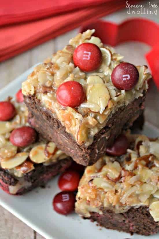 German Chocolate Cherry Bars are loaded with Cherry M&Ms and topped with a thick layer of gooey coconut almond goodness