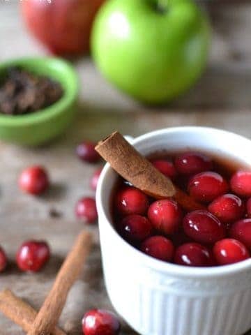 Spiced Cranberry Apple Cider, is a perfect blend of all the tastes of winter. This quick and easy hot drink is made in a slow cooker and makes for a wonderful holiday drink.