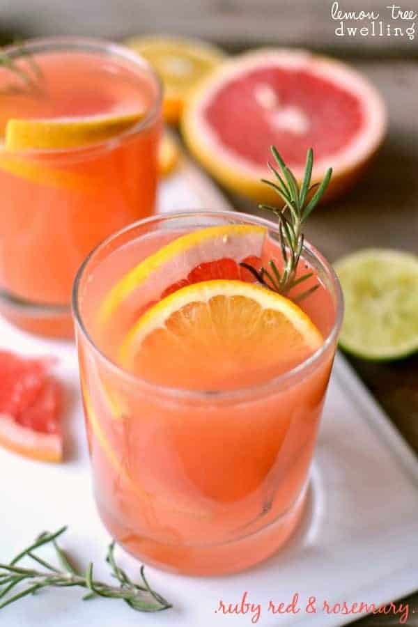 Ruby Red Rosemary Cocktail is a refreshing drink that makes a surprising addition to your fall table. Ruby red grapefruit juice with a splash of lemon and lime and a sweet rosemary simple syrup