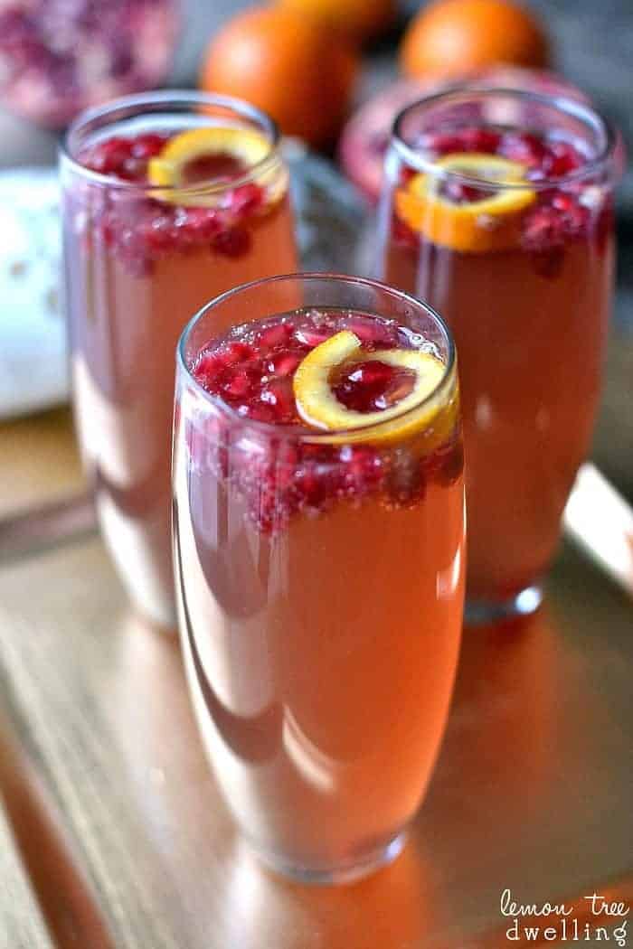 Pomegranate Orange Fizz Cocktail combines the classic flavors of pomegranate and orange with the celebratory feel of champagne. This festive drink is sure to be a crowd favorite.