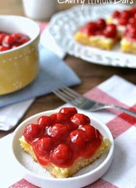 Cherry Lemon Bars are a delicious easy bar to make for any occasion. These lemon dessert squares are enhanced with the tart flavor of cherry. The BEST simple lemon bar recipe!