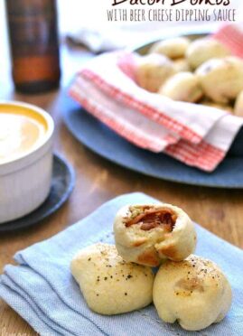 Bacon Bombs with Beer Cheese Dipping Sauce will be your new favorite appetizer! These bite sized rolls with bacon are the perfect combination for game day!