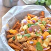 BBQ Chicken Sweet Potato Poutine is a delicious twist on a classic Canadian dish. Made with crispy sweet potato fries, this easy dish is perfect for snack time, dinnertime, or game time!