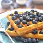 Blueberry Orange Waffles are light & fluffy and easy to make. These delicious brunch waffles are perfect with warm vanilla syrup. A quick and easy breakfast!