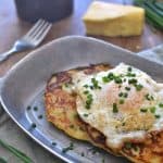 Savory Irish Potato Pancakes, loaded with Kerrygold Skellig cheese, fresh chives, and minced garlic for a delicious meal