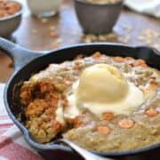 An Oatmeal Scotchie Pizookie is a deep dish decadent dessert everyone can enjoy! This lightened up version is a perfect hot dish for those cold winter nights, reminiscent of a warm oatmeal cookie!