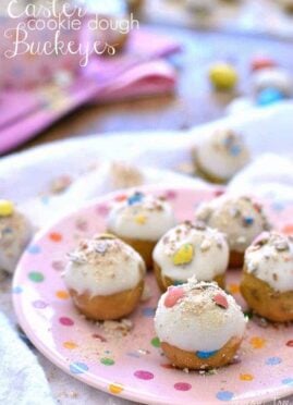 Easter Cookie Dough Buckeyes are made with peanut butter cookie dough and stuffed with malted milk balls and dipped in white chocolate.