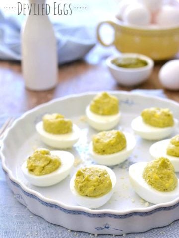 Parmesan Pesto Deviled Eggs are a easy and delicious protein snack or breakfast treat. These 5-ingredient deviled eggs are flavored with a touch of lemon and a big burst of flavor!