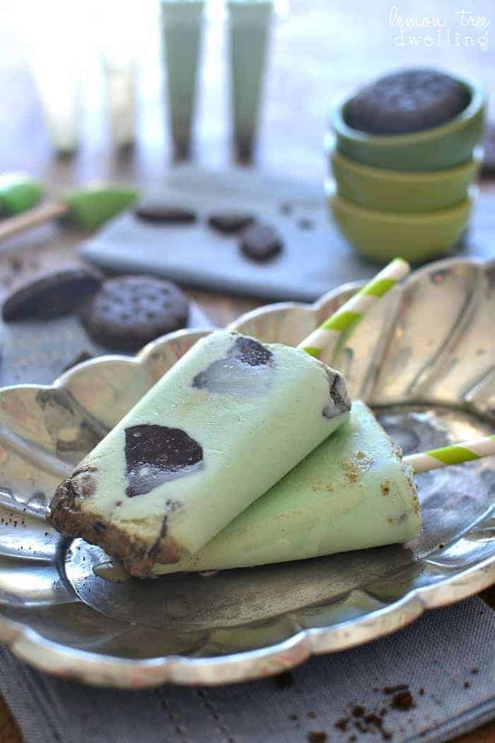 Creamy, delicious Thin Mint Ice Cream Popsicles are made with fresh cream and Thin Mint Girl Scout cookies!