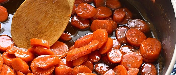These Brown Sugar Glazed Carrots soar to a whole new level! Made with just 4 ingredients, they come together quickly and make the perfect holiday side dish!
