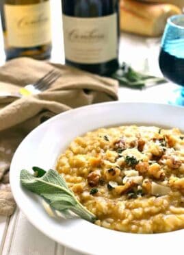 Butternut Squash Risotto is rich and creamy, flavored with allspice, walnuts, Parmesan, and chardonnay. It's the perfect fall risotto recipe, and a delicious addition to any holiday table!