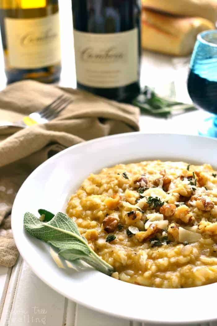 Butternut Squash Risotto is rich and creamy, flavored with allspice, walnuts, Parmesan, and chardonnay. It's the perfect fall risotto recipe, and a delicious addition to any holiday table!