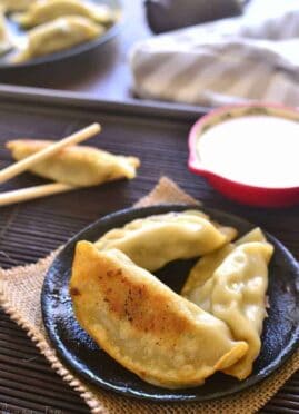 This Creamy Ginger Soy Dipping Sauce is sweetened with honey and perfect for dipping pot stickers, spring rolls, or your favorite Asian appetizers!