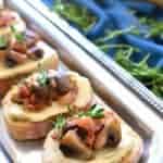 Mushroom Bacon Swiss Crostini is packed with delicious flavor and so simple to make! The perfect holiday appetizer recipe