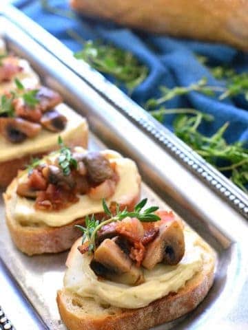 Mushroom Bacon Swiss Crostini is packed with delicious flavor and so simple to make! The perfect holiday appetizer recipe
