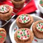 Peanut Butter Cup Stuffed Ginger Cookies are deliciously sweet with an unexpected twist! The perfect addition to your holiday cookie plate!
