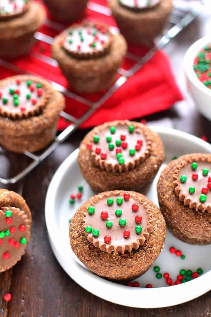 Peanut Butter Cup Stuffed Ginger Cookies are deliciously sweet with an unexpected twist! The perfect addition to your holiday cookie plate!