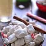 Peppermint Eggnog Muddy Buddies combine two classic flavors in a holiday treat that's as simple as it is delicious! This 5 minute holiday snack is a fan favorite!