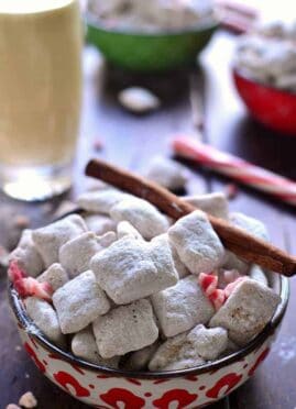 Peppermint Eggnog Muddy Buddies combine two classic flavors in a holiday treat that's as simple as it is delicious! This 5 minute holiday snack is a fan favorite!