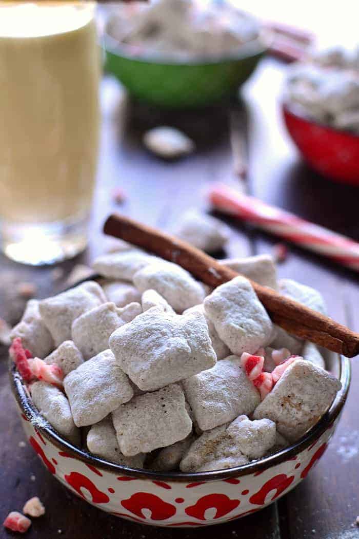 Peppermint Eggnog Muddy Buddies combine two classic flavors in a holiday treat that's as simple as it is delicious! This 5 minute holiday snack is a fan favorite!