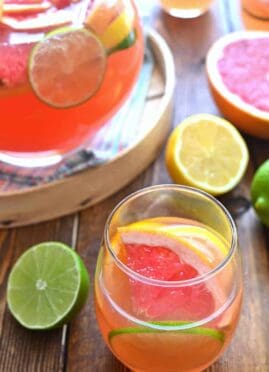 Delicious Citrus Sangria is made with just 4 simple ingredients and loaded with fresh citrus fruit. A perfectly refreshing cocktail any time of year!