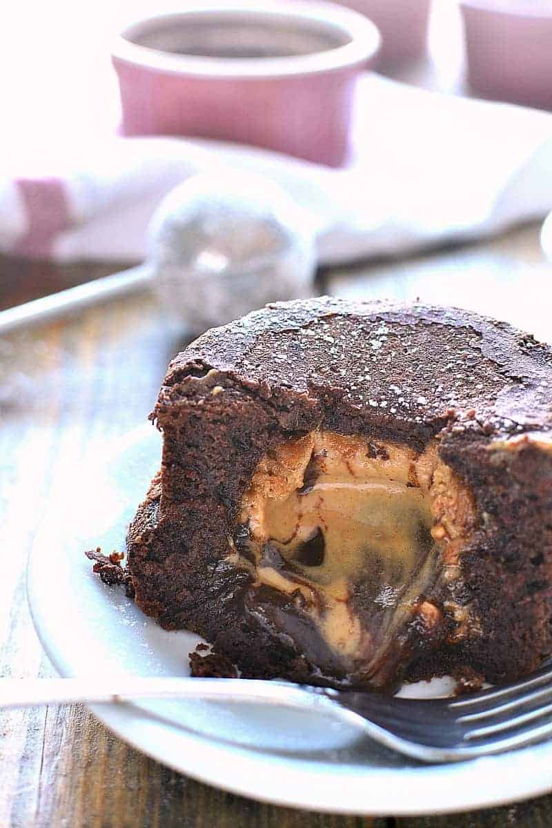 Chocolate Peanut Butter Lava Cakes combine two classic flavors in one deliciously ooey gooey dessert. This sinfully delicious dessert is perfect for Valentine's Day or any special occasion!