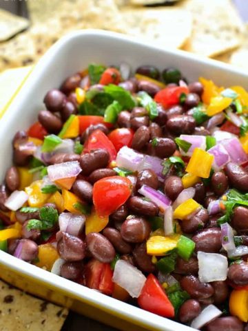 This Confetti Bean Dip is light, refreshing, and packed with delicious flavor! This 5 minute dip is perfect for game day, taco night, or everyday snacking!
