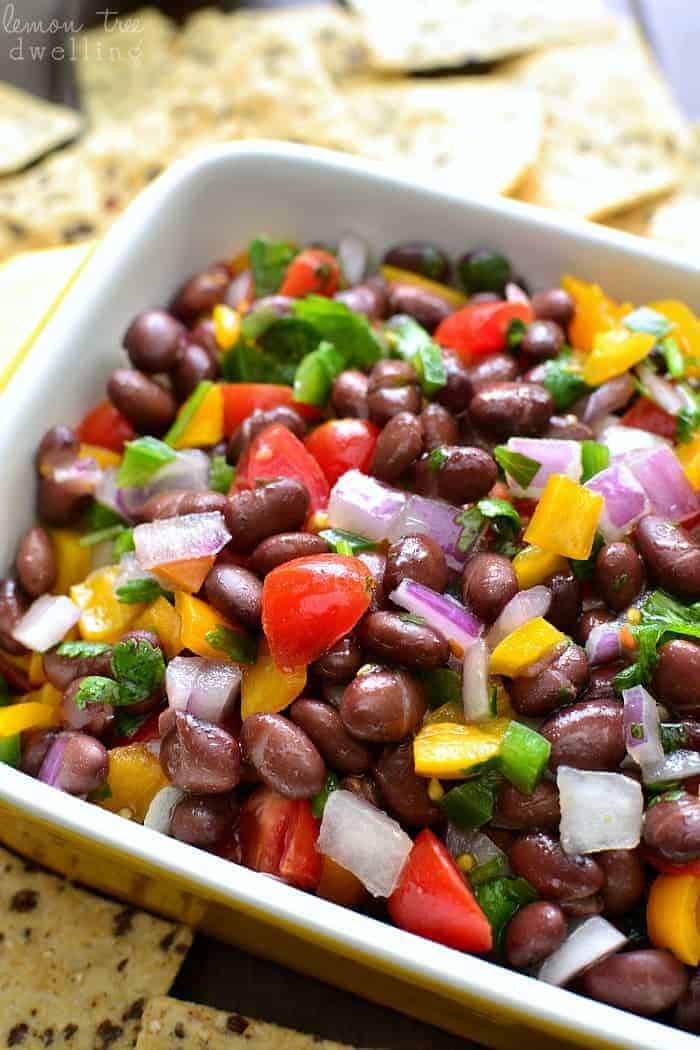 This Confetti Bean Dip is light, refreshing, and packed with delicious flavor! This 5 minute dip is perfect for game day, taco night, or everyday snacking!