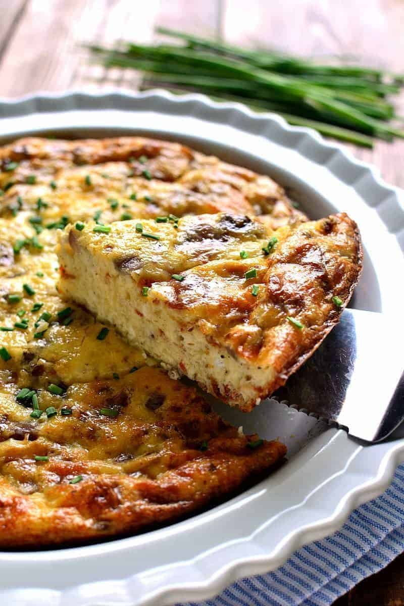 This Crustless Quiche Lorraine is a delicious twist on a classic recipe. This crustless quiche is loaded with bacon, eggs, Swiss cheese, and cream. Perfect for Easter brunch or any family gathering that will please all your guests.