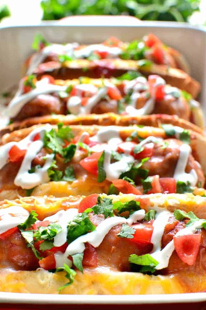 These Enchilada Meatball Subs combine two family favorites in one delicious dish that's easy to make and perfect for busy weeknights! A quick game day meal