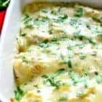 These Roasted Vegetable Enchiladas are packed with veggies and beans then topped with a creamy chile verde sauce and melted cheese. A perfect meatless meal