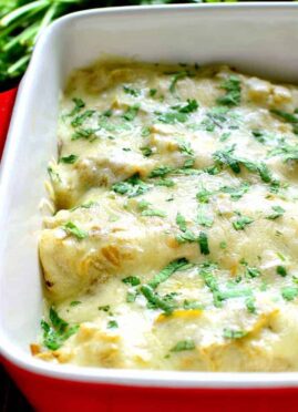 These Roasted Vegetable Enchiladas are packed with veggies and beans then topped with a creamy chile verde sauce and melted cheese. A perfect meatless meal