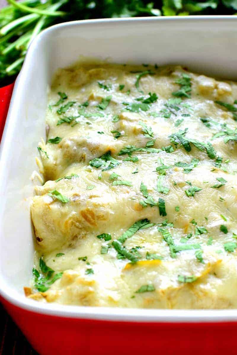 These Roasted Vegetable Enchiladas are packed with veggies and beans then topped with a creamy chile verde sauce and melted cheese. A perfect meatless meal