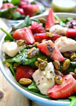 This Strawberry Spinach Salad is an AMAZING twist on a summer favorite! This salad is sure to become your new go-to for picnics, cookouts, and quick meals