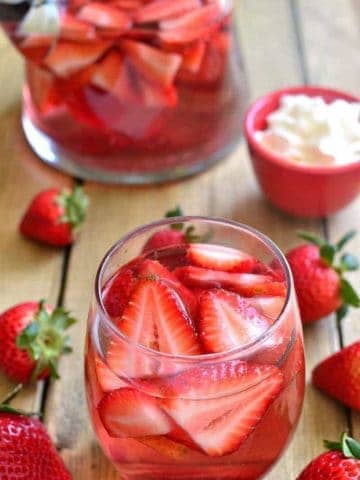 overhead image of a glass filled with strawberry shortcake sangria