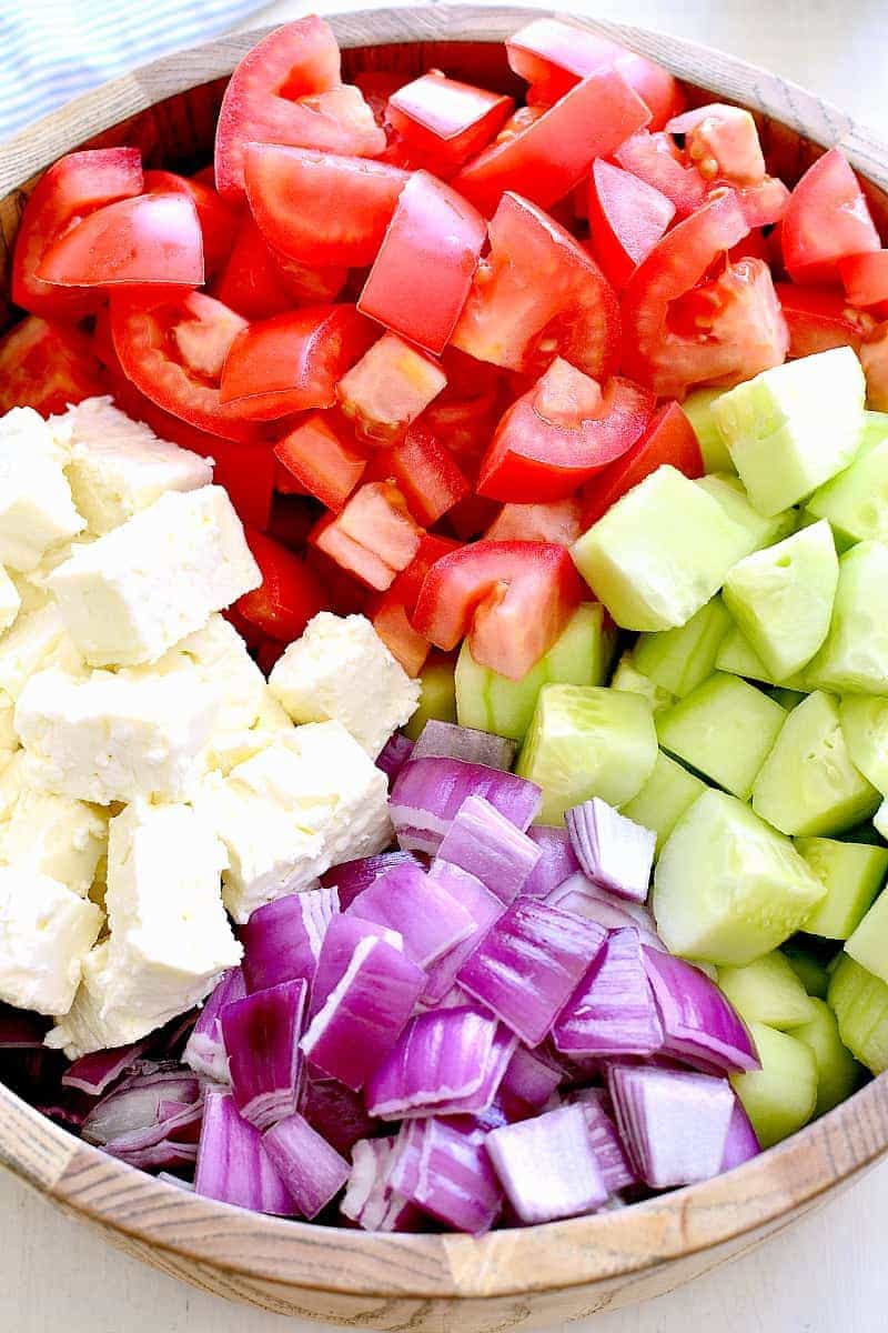 Ingredients for a tomato cucumber feta salad